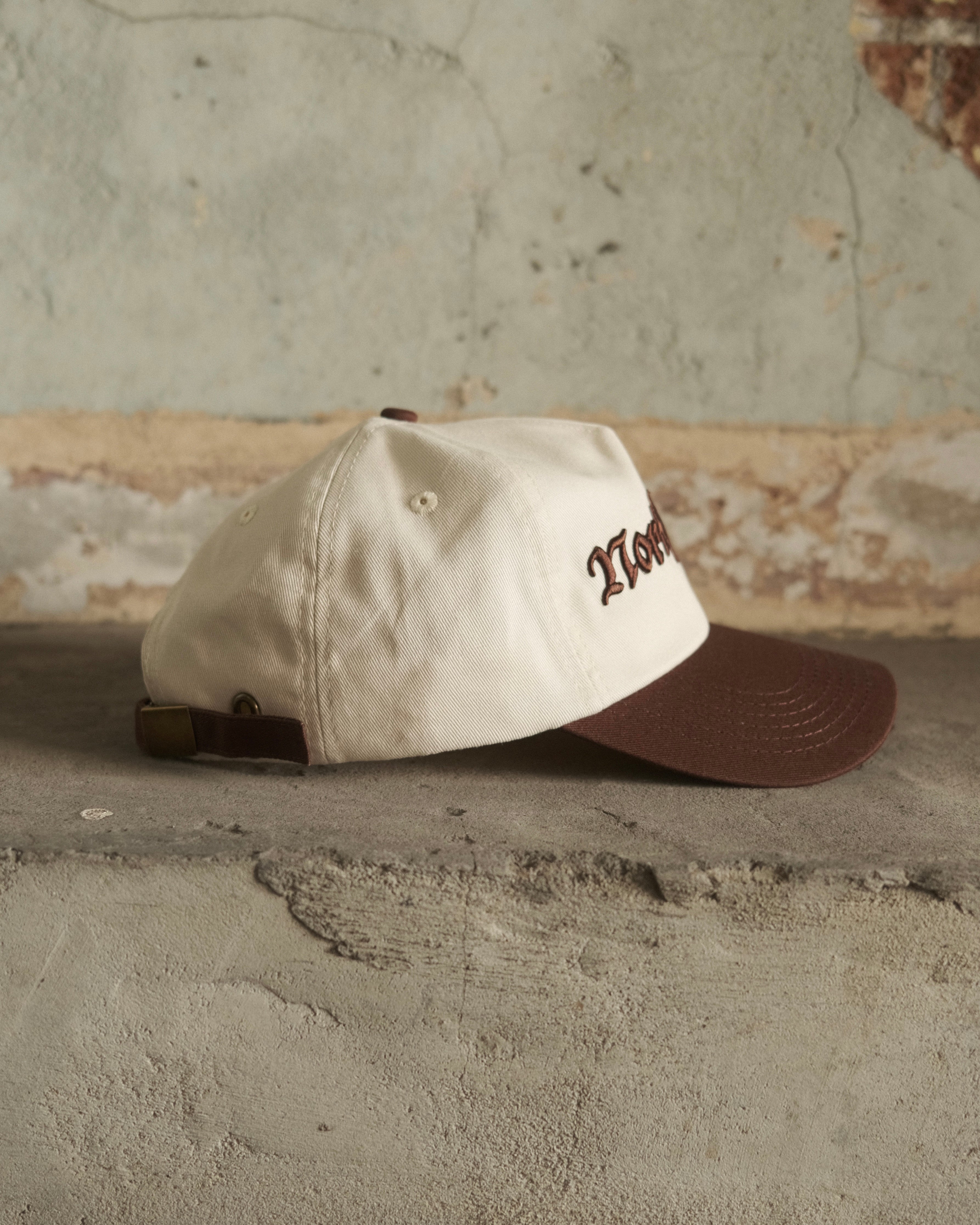 Brown North Cross baseball cap with clasp back