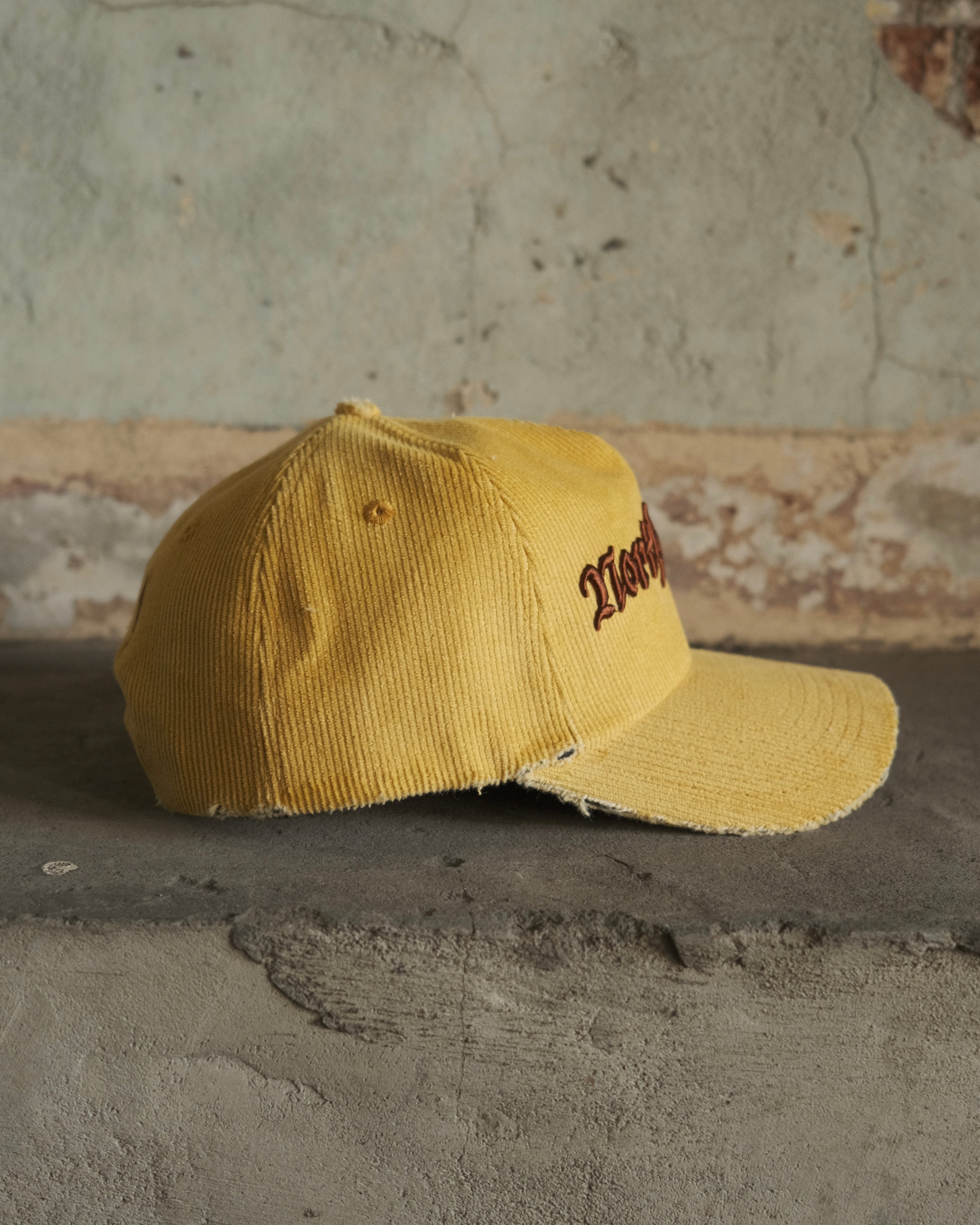 North Cross cord cap with distressing and snapback