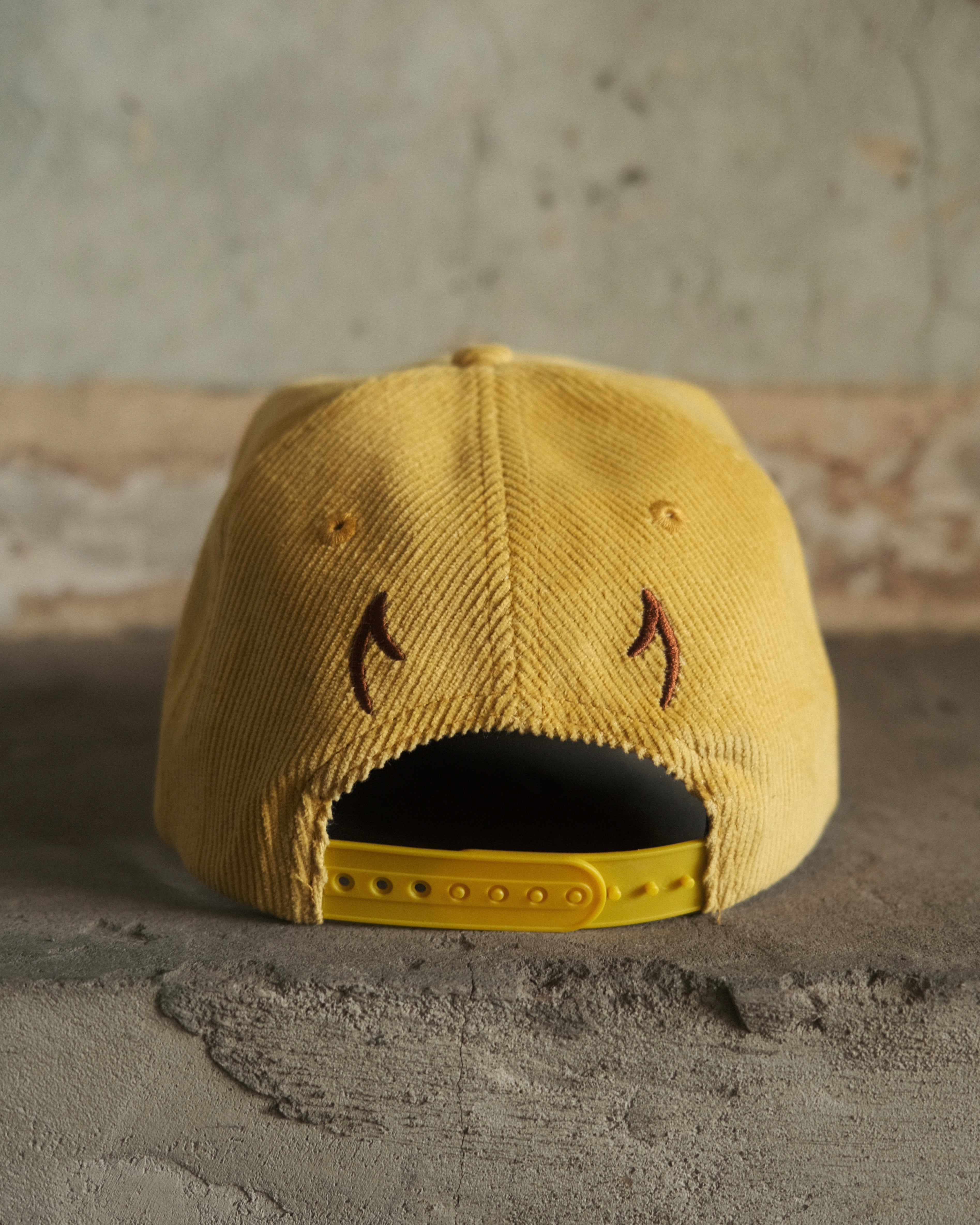 North Cross cord cap snapback with distressing