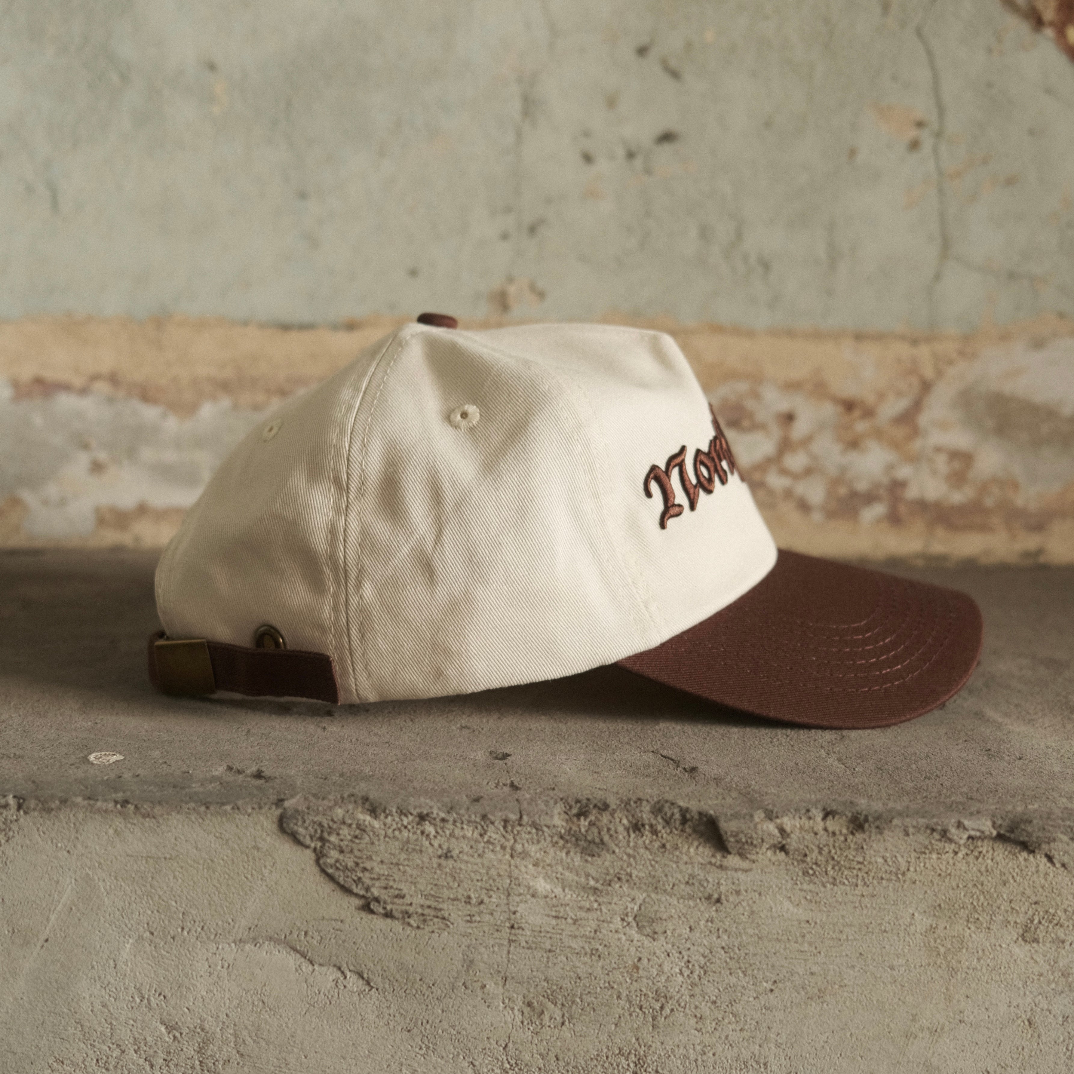 Brown North Cross baseball cap with clasp back