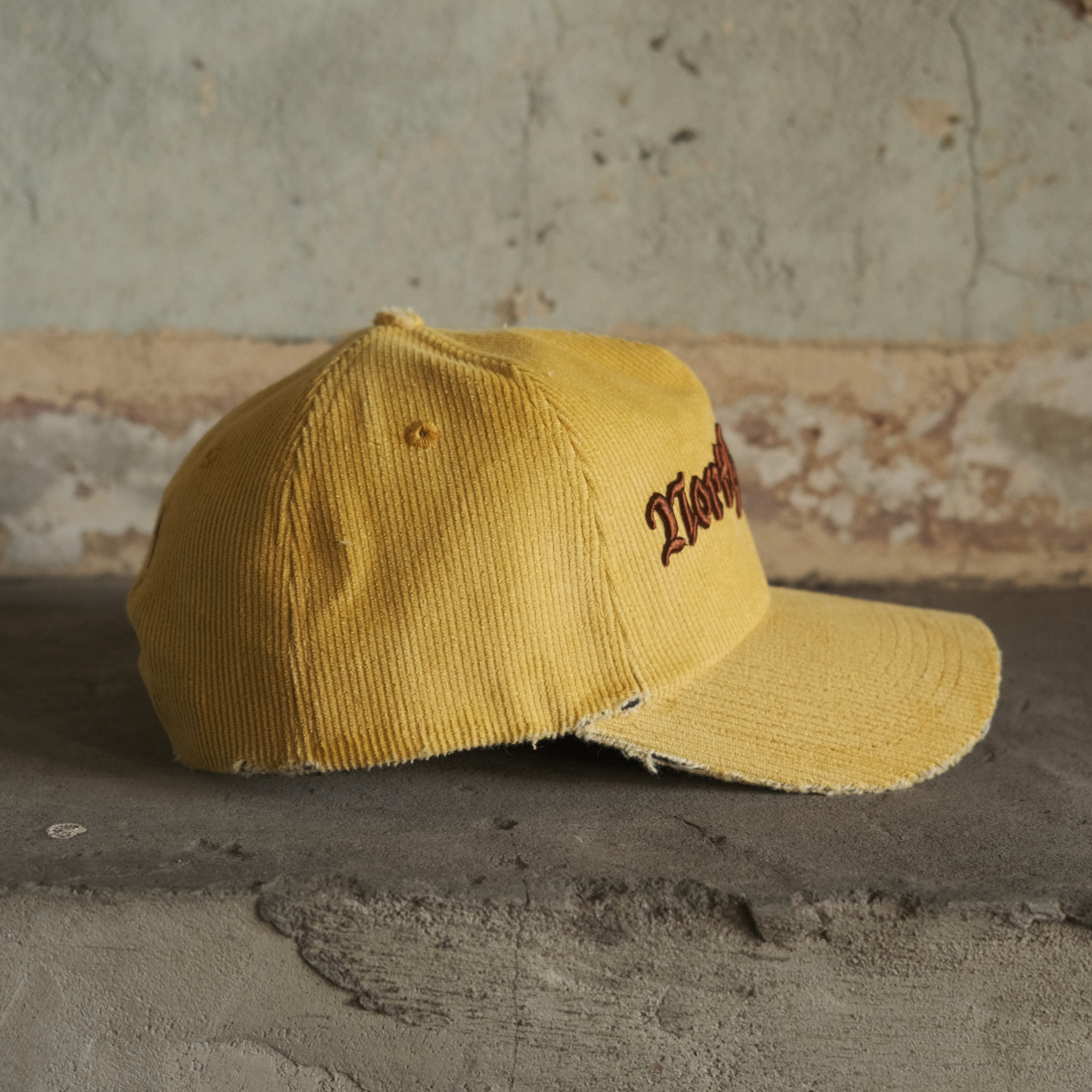 North Cross cord cap with distressing and snapback