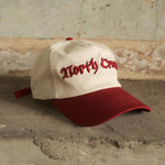 Red North Cross baseball cap with clasp back