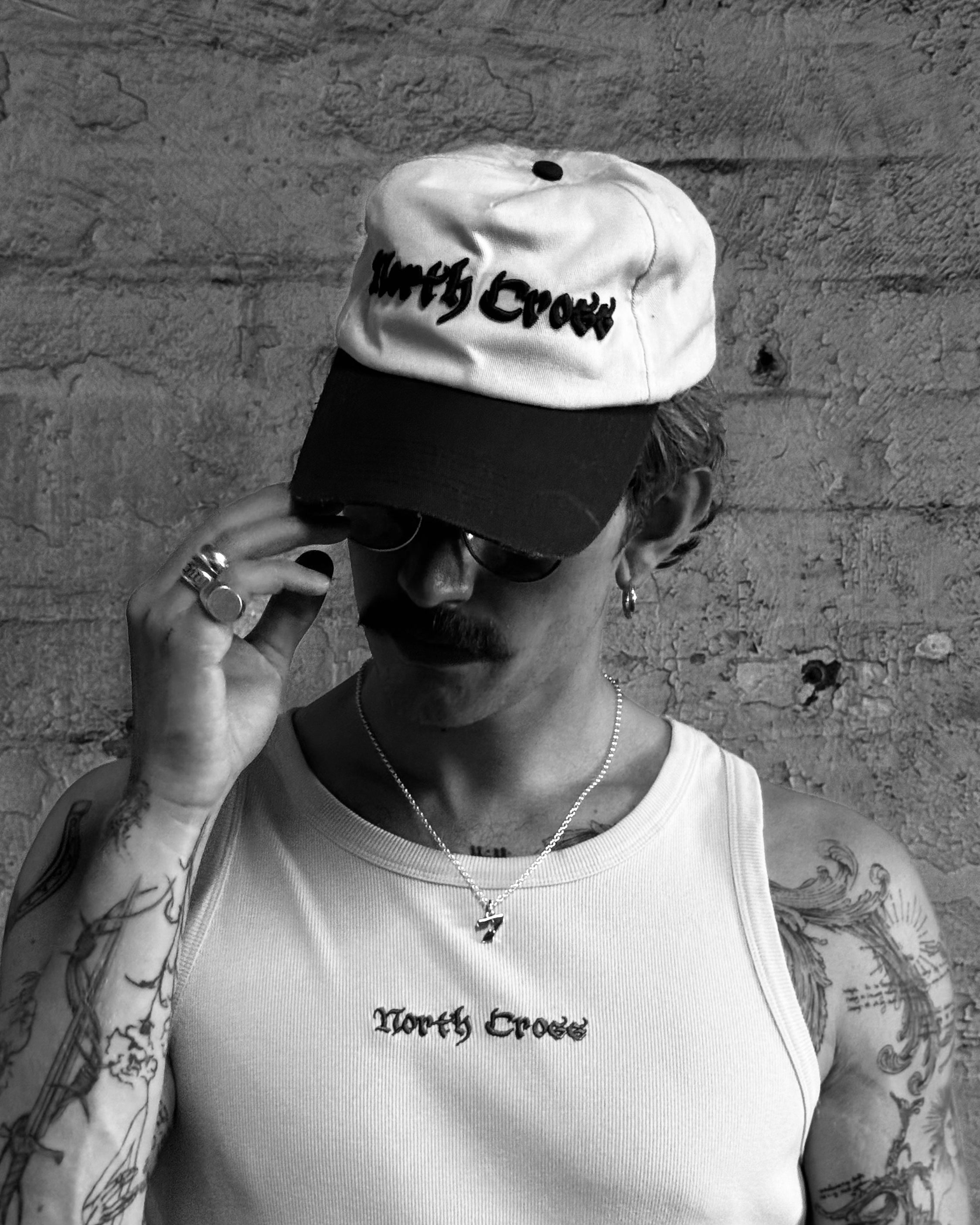 Josef Michael wearing the North Cross lucky 7 necklace in solid 925 silver on 20" necklace