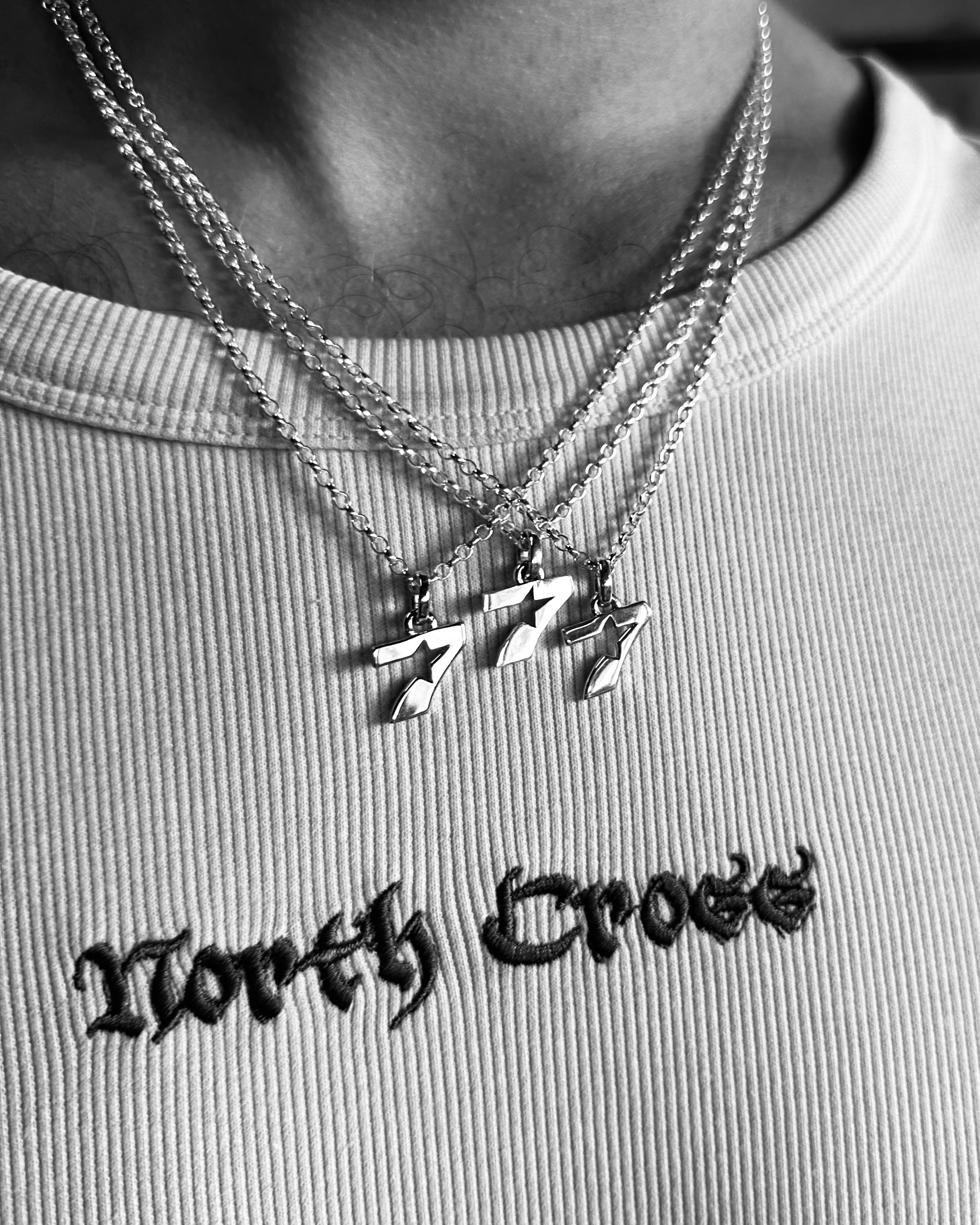 The North Cross Lucky 7s on 18" Necklace